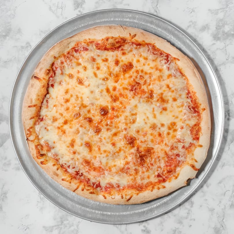 A freshly baked Pointer's Pizza cheese pizza on a metal pan, viewed from directly above.